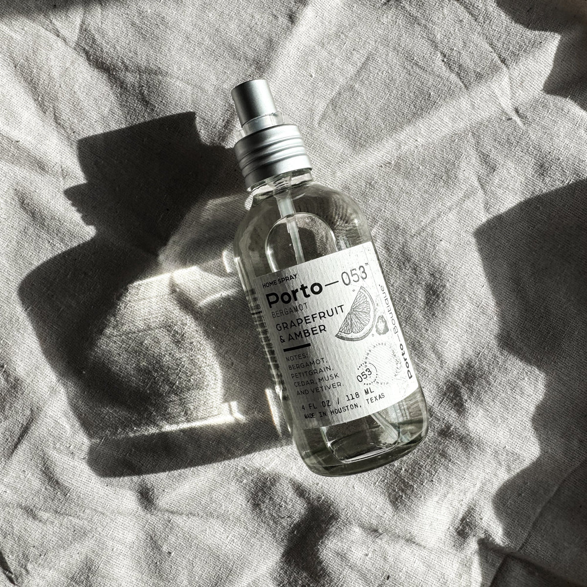Porto-053 room spray bottle on white linen
