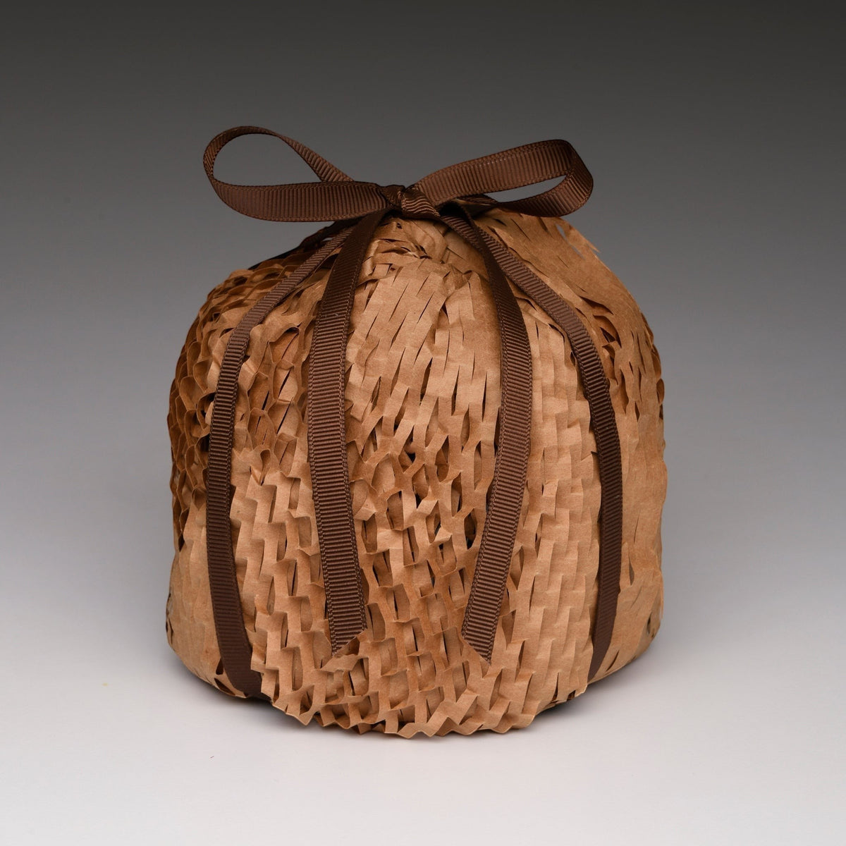 Fall Vibe Grande candle gift-wrapped in kraft paper with brown ribbon