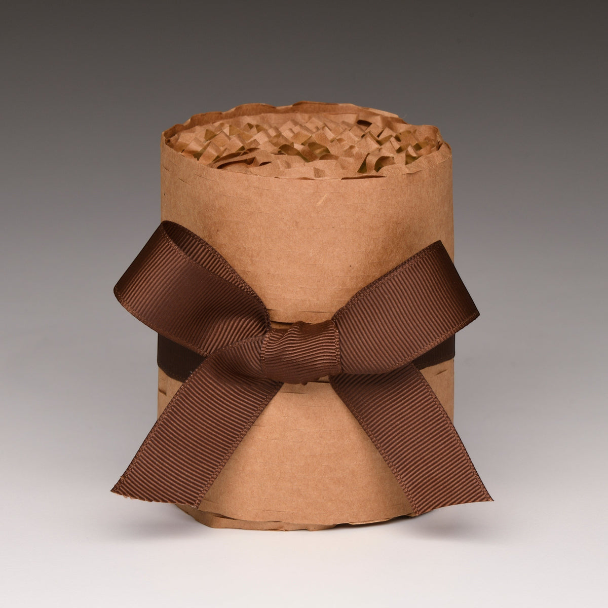 Fall Vibe Classic candle gift-wrapped in kraft paper with a brown bow