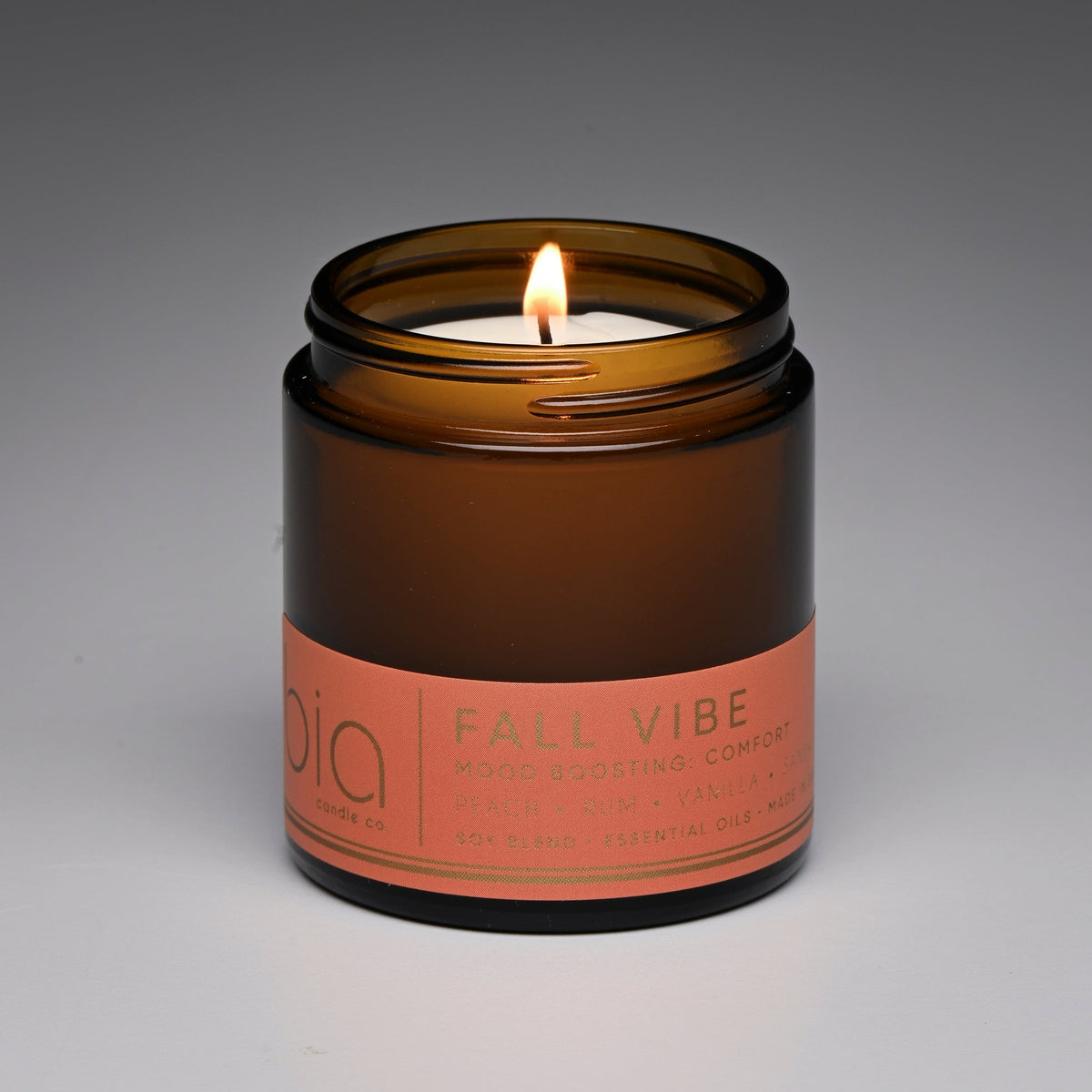 Lit Fall Vibe Classic candle with its orange label