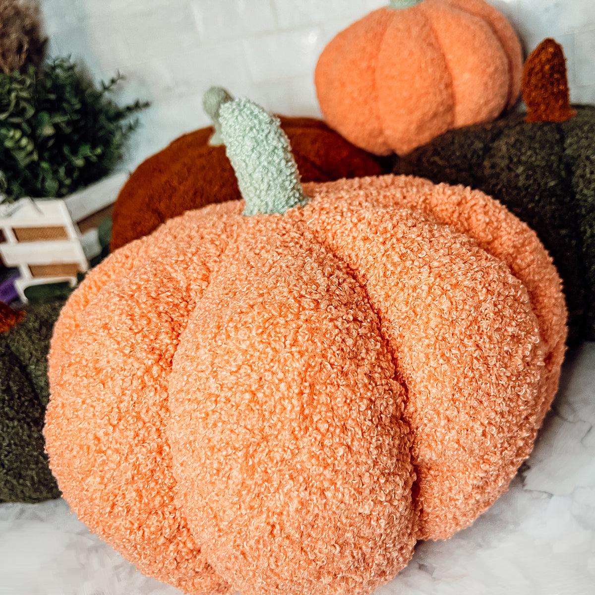 Close-up of an orange plush pumpkin