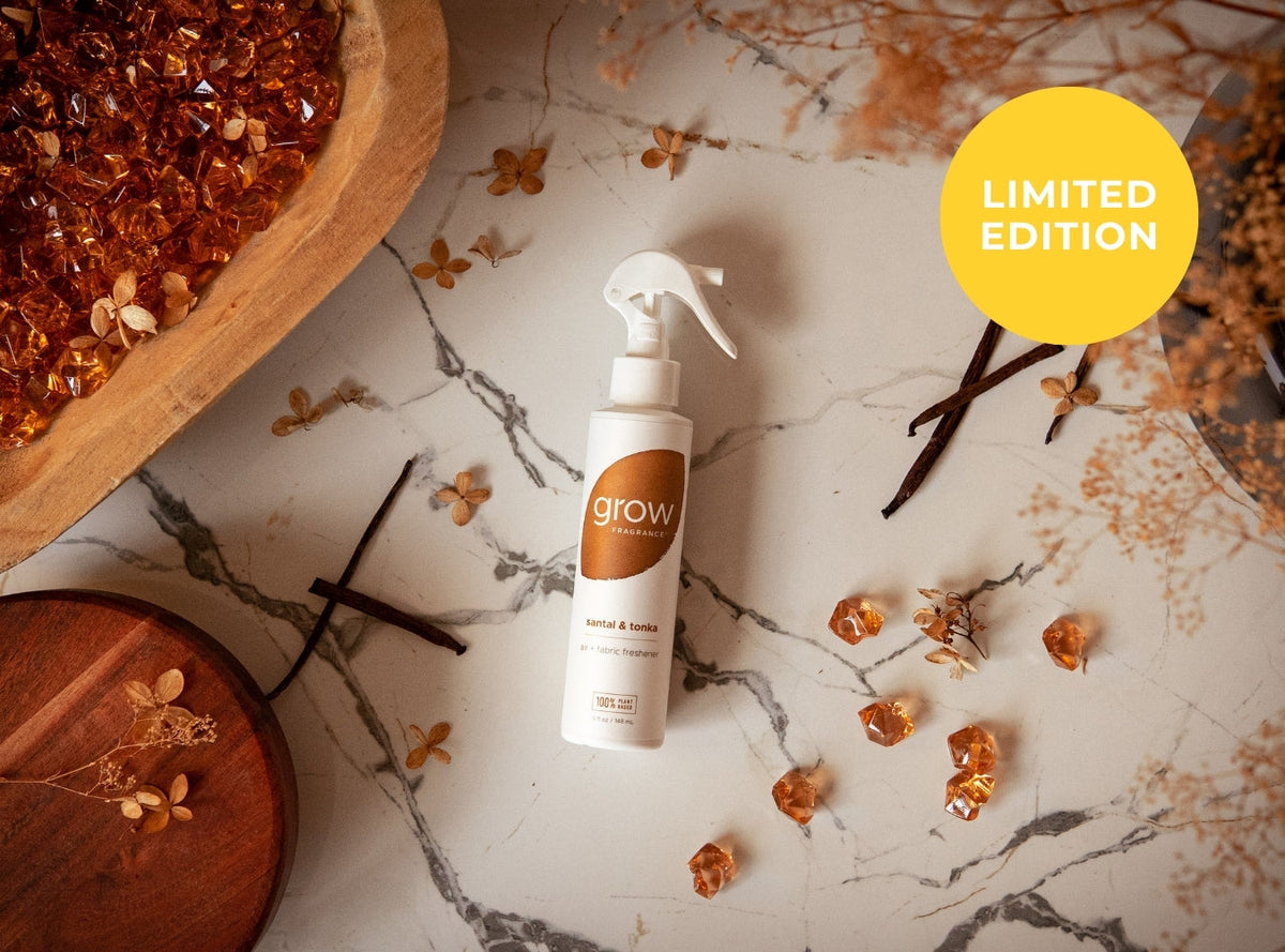 Santal & Tonka spray on marble with amber resin and tonka beans