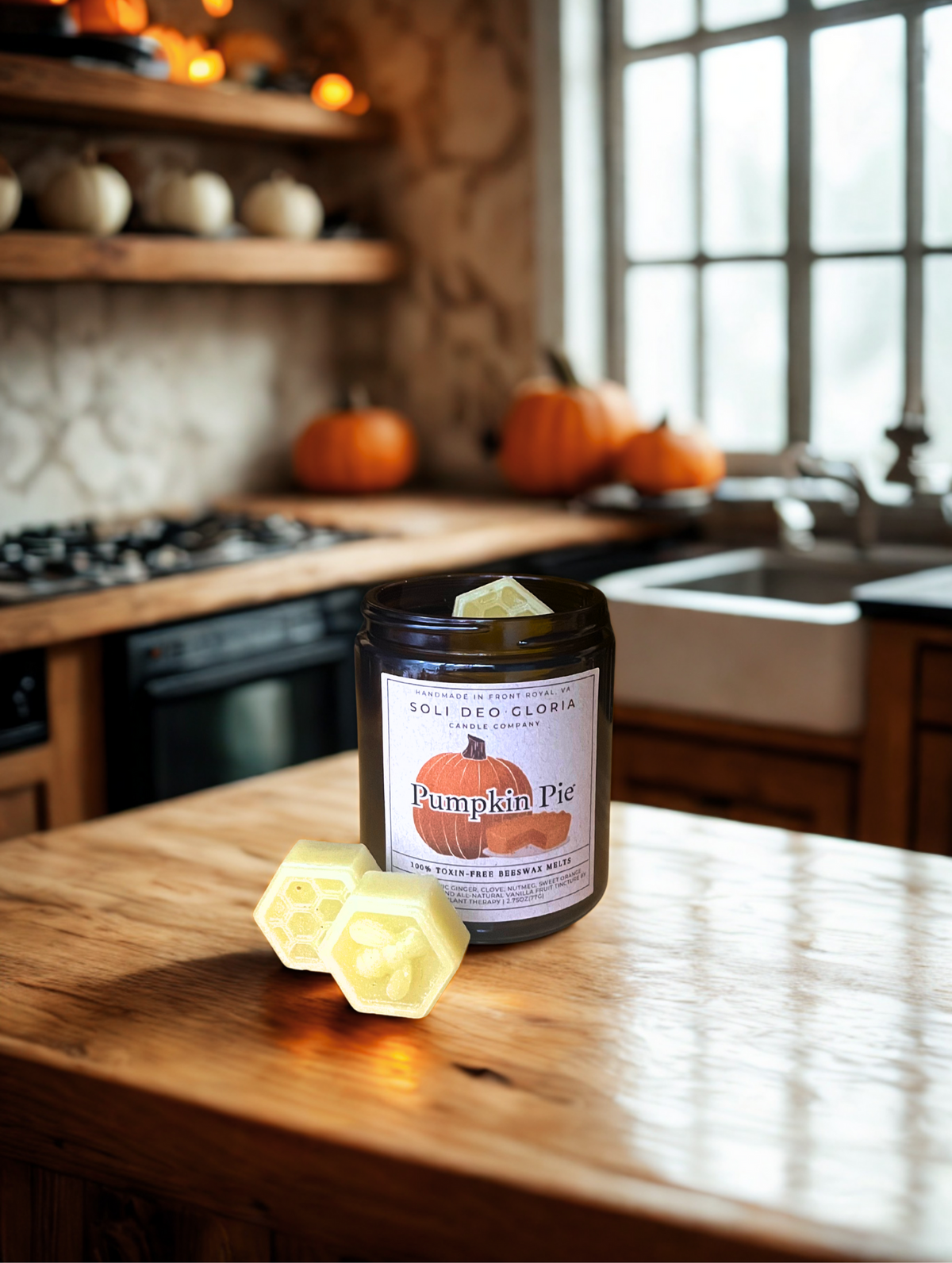 Pumpkin Pie beeswax candle on a rustic kitchen counter