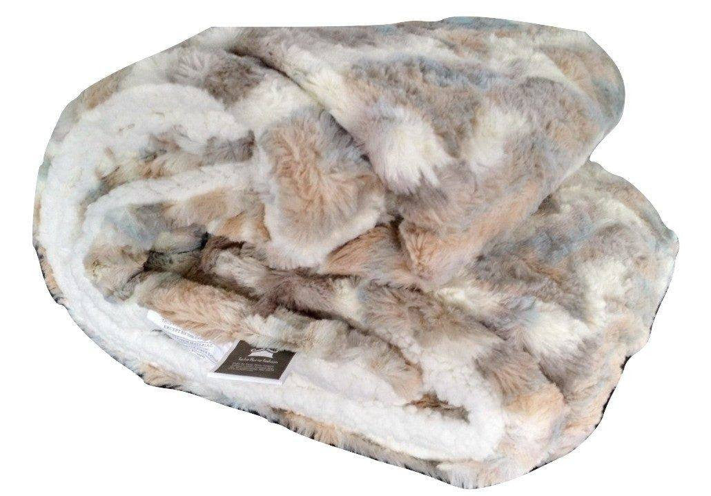 Folded Russian Lynx throw with the sherpa side showing at the edges
