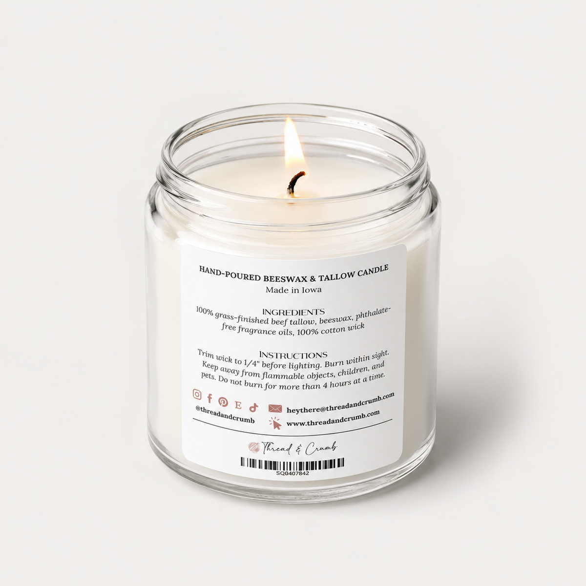Back of the Spiced Banana Bread candle jar with ingredients and care instructions